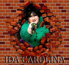 Ida Carolina dressed like the Incredible Hulk smashing through a brick wall.