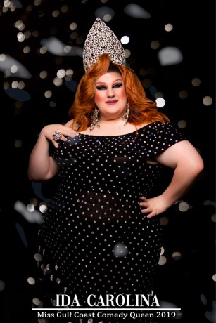 Ida Carolina a polka dot dress in her crown for Miss Gulf Coast Comedy Queen 2019.